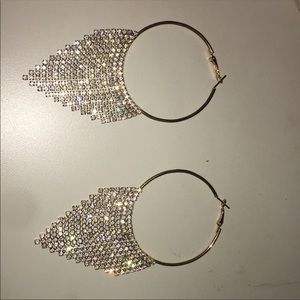 Dangly hoop earrings will take offers